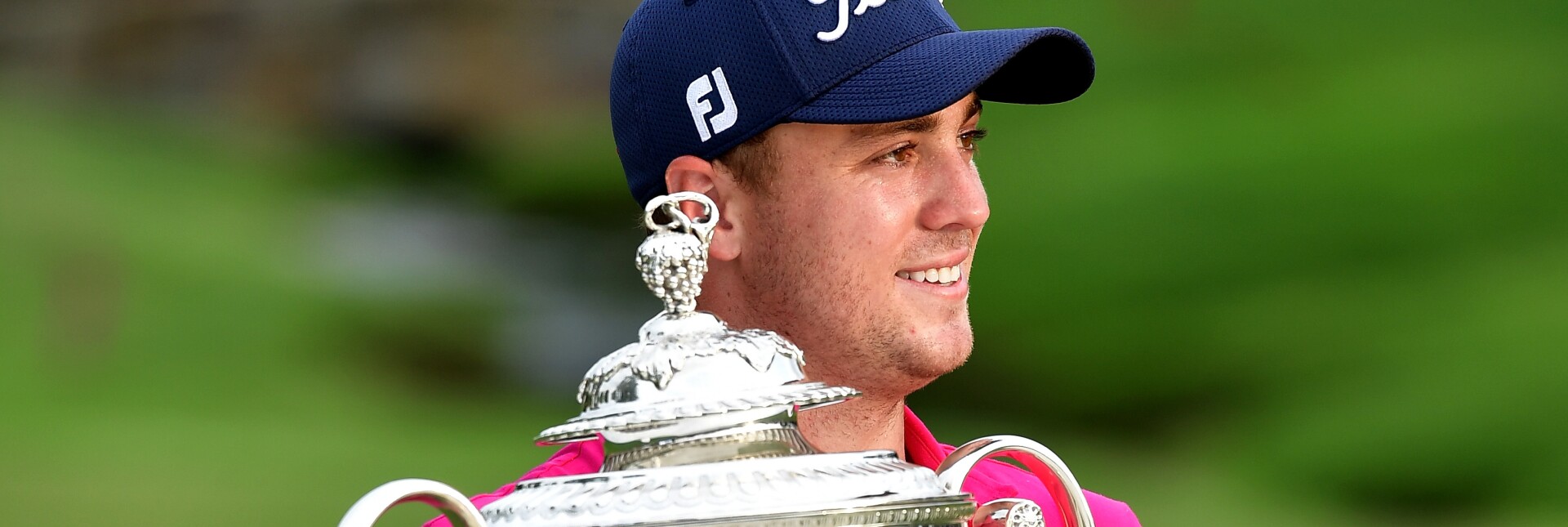 Justin Thomas poses with the Wanamaker Trophy