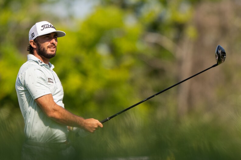 Max Homa hits his tee shot on the first hole during a practice round of the 2021 PGA Championship