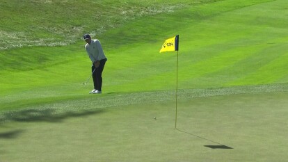 Sergio Garcia has a nice chip in on 14