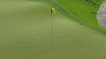 Gary Woodland sticks approach shot on No. 16