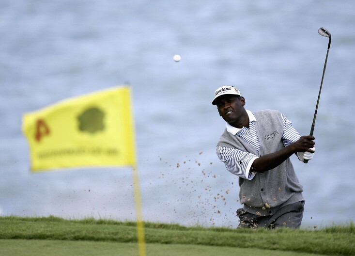 Vijay Singh of Fiji hits onto the 4th green during the final round of the 2004 PGA Championship