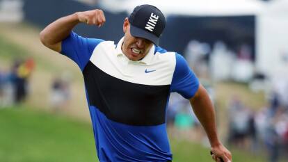 Brooks Koepka of the United States reacts after putting in to win on the 18th green during the final round of the 2019 PGA Championship 