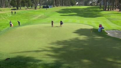 Ricky Fowler has a tight chip up on 13