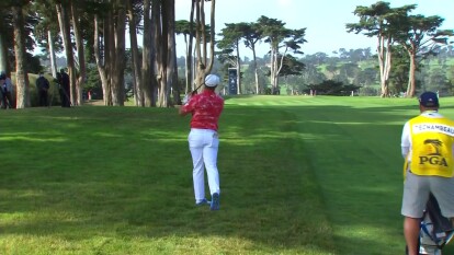 Bryson DeChambeau has a nice approach out of the rough on 13