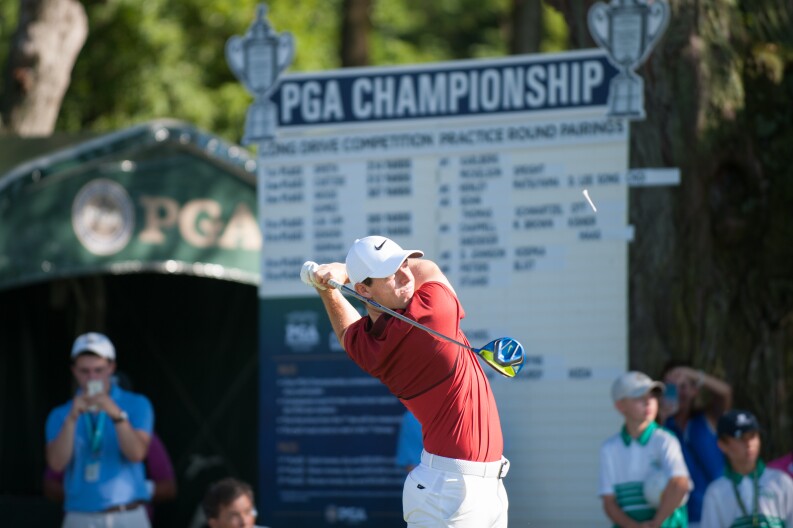 Rory McIlroy watches his tee shot during the PGA Championship Long Drive Competition