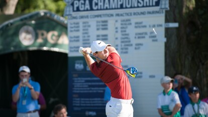 Rory McIlroy watches his tee shot during the PGA Championship Long Drive Competition